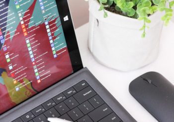 black laptop computer beside black wireless mouse