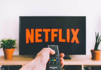 Free Person Holding a Remote Control Stock Photo