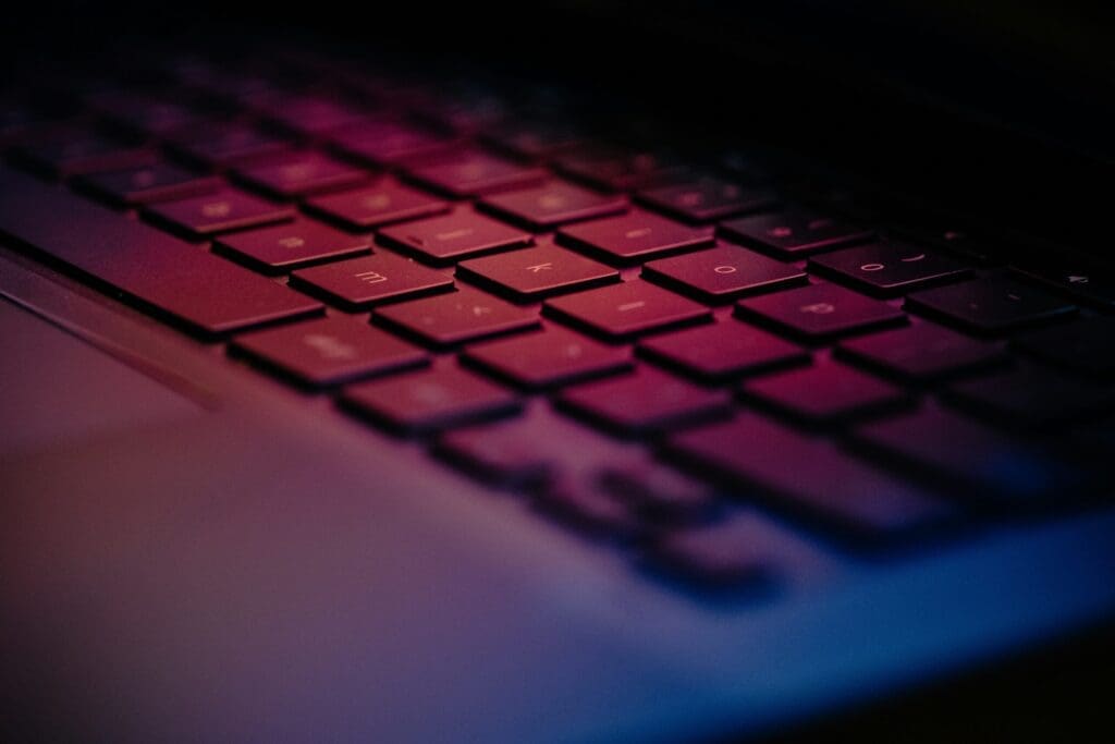 a-close-up-of-a-keyboard-with-a-blurry-background
