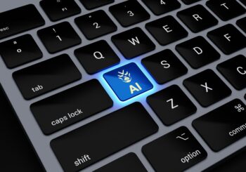 a computer keyboard with a blue light on it